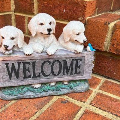 Yellow Labs "Welcome" Sign