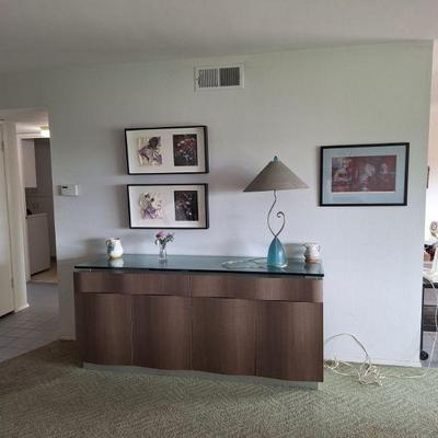 Sculptured credenza 
72x20x32
4 door 2 drawers