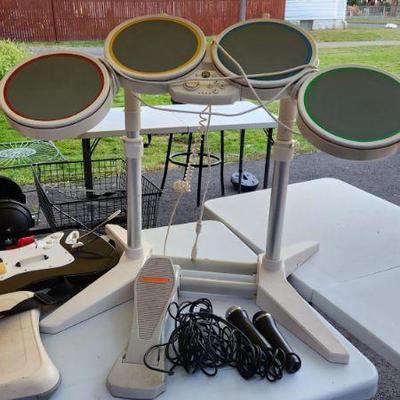Wii rockband set with drums guitar and 2 mics