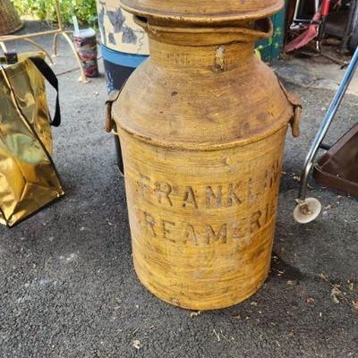 Antique milk can
