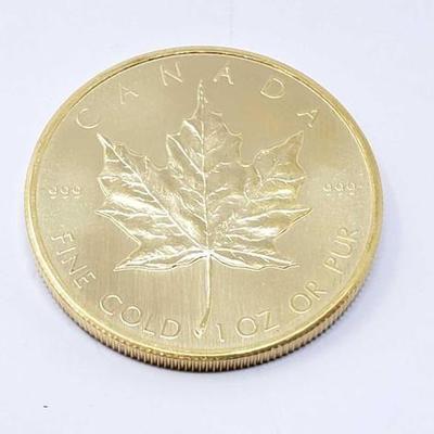 #110 â€¢ 1 Oz Canadian Maple Leaf .9999 Gold Coin
