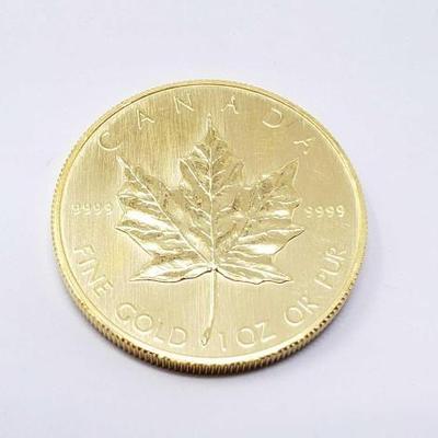 #102 â€¢ 1 Oz Canadian Maple Leaf .9999 Gold Coin
