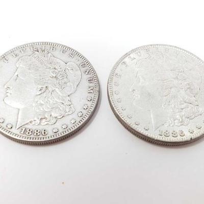 #176 â€¢ 2 1886 Morgan Silver Dollars
