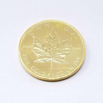 #104 â€¢ 1 Oz Candian Maple Leaf .9999 Gold Coin
