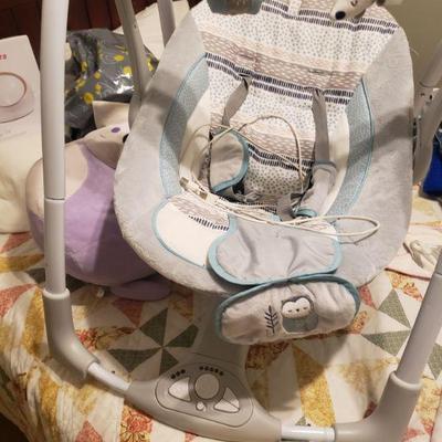 Musical baby swing