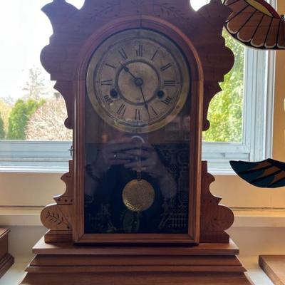 Lots of antique clocksâ€”mantel clocks, grandmother clocks and wall clocks
