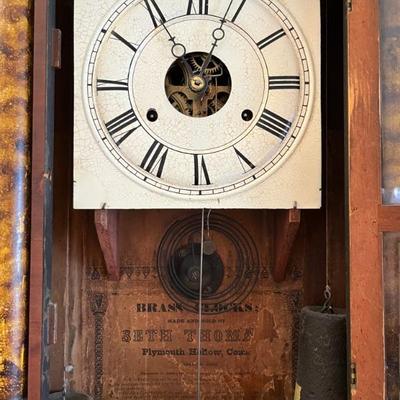 Lots of antique clocksâ€”mantel clocks, grandmother clocks and wall clocks