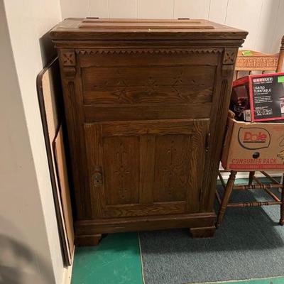 19th century Eastlake style icebox (like the kind that that held a block of ice) converted into a chic bar