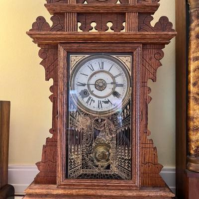 Lots of antique clocksâ€”mantel clocks, grandmother clocks and wall clocks