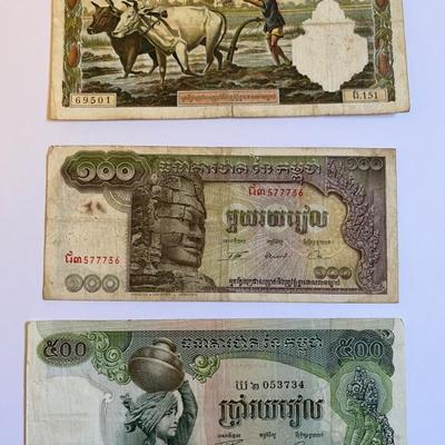 Vintage and antique stamps, coins and currency from Vietnam, Thailand, New Zealand and Cambodia, much if it is pre-Vietnam War, colonial era