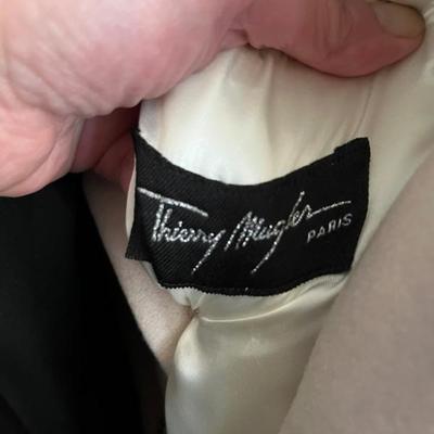 An incredible menâ€™s dress coat from Thierry Muglerâ€”white cashmere and wool, trimmed in red wool with silver buttons in perfect...