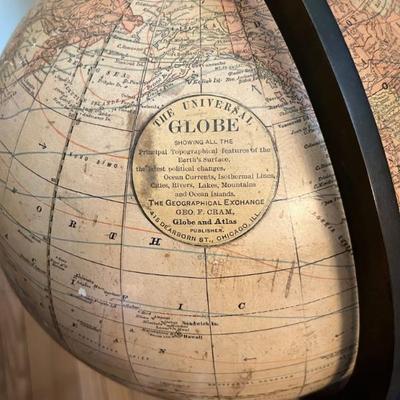 Antique Cram globe, 1912-1918, mounted in a cast iron stand