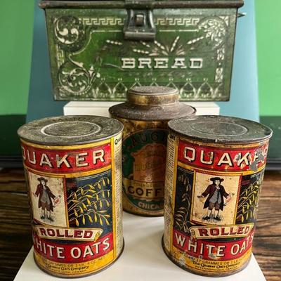 Antique advertising tins and cardboard containers: G&P bread, McLaughlin Coffee, Quaker, CR Tartar, Wag Coffee, Scheppâ€™s Cocoanut,...