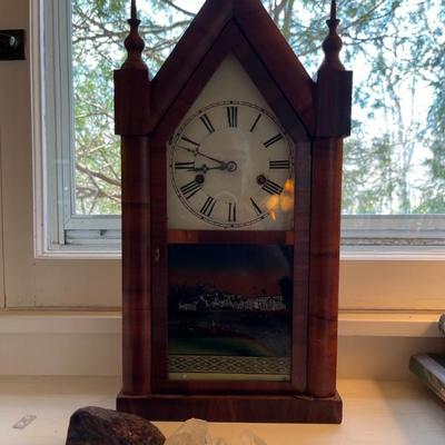 Lots of antique clocksâ€”mantel clocks, grandmother clocks and wall clocks