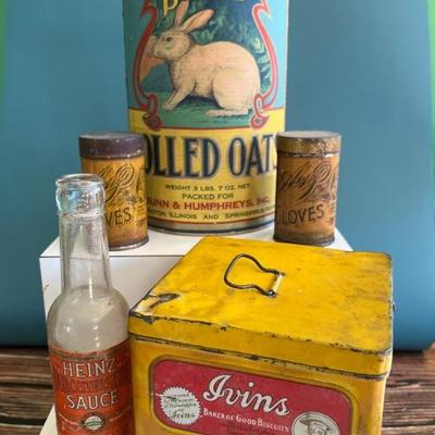 Antique advertising tins and cardboard containers: G&P bread, McLaughlin Coffee, Quaker, CR Tartar, Wag Coffee, Scheppâ€™s Cocoanut,...
