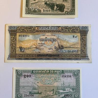 Vintage and antique stamps, coins and currency from Vietnam, Thailand, New Zealand and Cambodia, much if it is pre-Vietnam War, colonial era