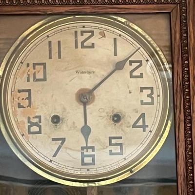 Antique wall clock by Watkins