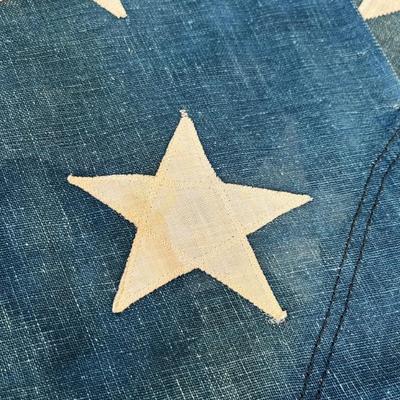 Huge early 48 star American flag, 8â€™ x 15â€™, all stitched with appliquÃ© stars, some minor water stains, c 1912-1917, around 1918...