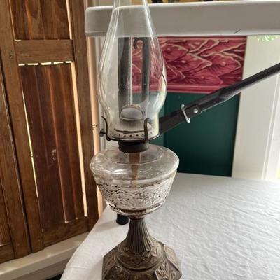 Antique oil lamps, lots of different sizes, from minis to large