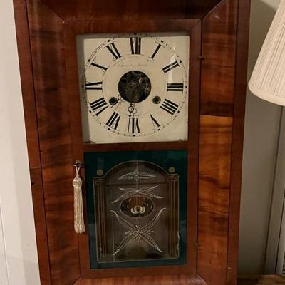 Lots of antique clocksâ€”mantel clocks, grandmother clocks and wall clocks
