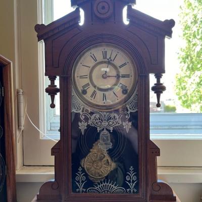 Lots of antique clocksâ€”mantel clocks, grandmother clocks and wall clocks