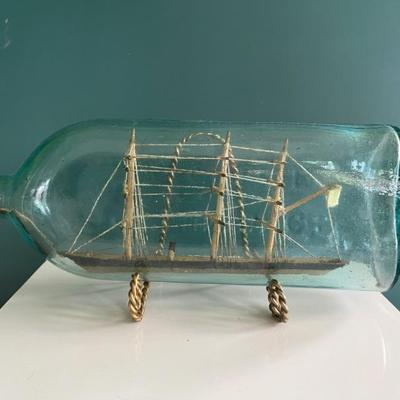 c. 1885 antique ship in a bottle, the bottle is a Dr Cumming Vegetine bottle, c 1885