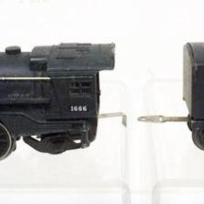 1125	LIONEL TRAIN O GAUGE #1666 LOCOMOTIVE WITH #2689W TENDER
