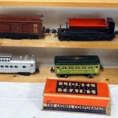 1138	LIONEL O GAUGE TRAIN CARS, #3814, #3859 DUMPER, #2812, #2432 CLIFTON, $607 PULLMAN, #400 BALTIMORE & OHIO
