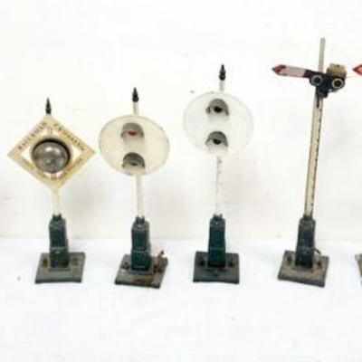 1214	GROUP OF ASSORTED TRAIN O GAUGE METAL SIGNALS
