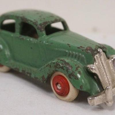 1229	ANTIQUE CAST IRON TOY CAR, APPROXIMATELY 4 IN X 1 3/4 IN H
