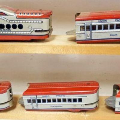 1175	O GAUGE TIN LITHO UNION PACIFIC TRAIN ENGINE WITH 4 CARS

