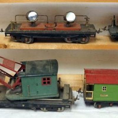 1186	LIONEL STANDARD GAUGE TRAIN CARS, #219 CRANE, #220 SEARCH LIGHT, #511 FLAT BE, #517 CABOOSE
