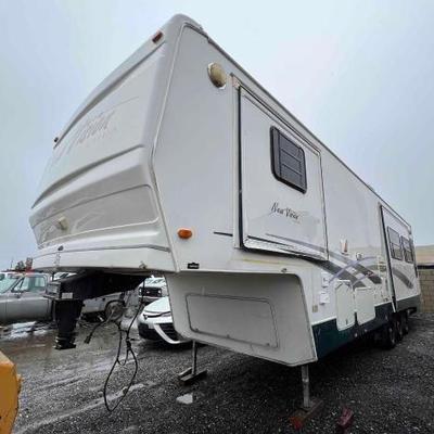 #120 â€¢ 2000 K-Z Sportsmen Trailer
