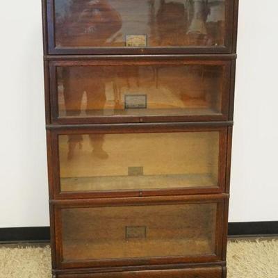 1126	OAK GLOBE WERNICKE 4 SECTION BARRISTER BOOKCASE, ONE DRAWER AT BASE, APPROXIMATELY 44 IN X 12 IN X 64 IN HIGH
