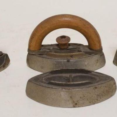 1205	MINIATURE SAD IRONS, GROUP OF 4 INCLUDING *SENSIBLE #6 N.R.S. & CO.*, TALLEST APPROXIMATELY 3 1/4 IN H
