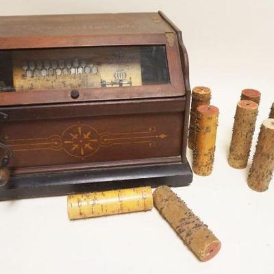 1161	CONCERT ROLLER ORGAN WITH 11 ROLLS, BELLOWS NOT FUNCTIONING, APPROXIMATELY 15 IN X 18 IN X 13 IN H

