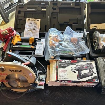 Tools including:  Skilsaw, Rotozip Spiral Saw, Craftsman Router, Bostitch