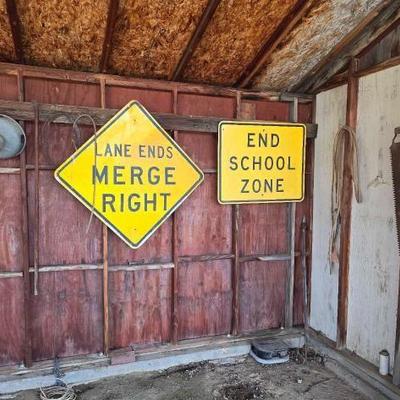 #5006 â€¢ Two Road Signs Feeder Wood Saw and Yard art
