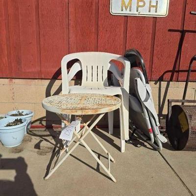 #2550 â€¢ (4) Chairs and Metal Table
