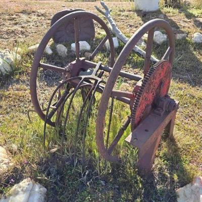 #1300 â€¢ Vintage Firehose Reel and 3 Pitch Forks
