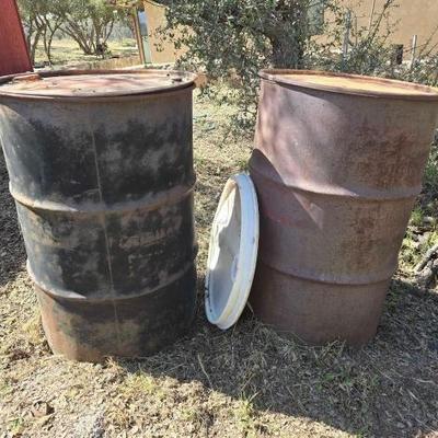 #5000 â€¢ Two Metal 55gal Drums with Lids
