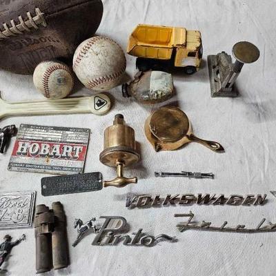#2338 â€¢ Emblems, Tags, Buddy L Truck, Stapler, Brass, Balls, and Metal Figures
