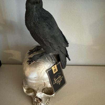 Skull and crow figure