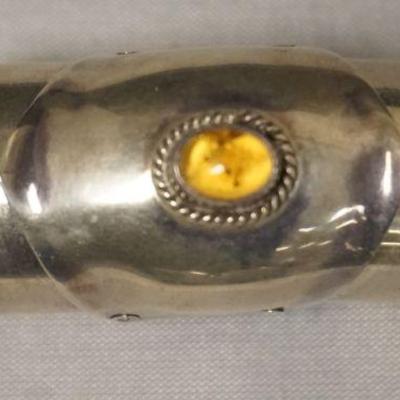 1259	STERLING SILVER KNUCKLE RING WITH STONE, APPROXIMATE SIZE 9
