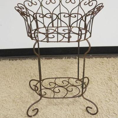1176	ANTIQUE ORNATE PAINT DECORATED RON & CARVED WOOD CROSS STRUCTURE FOR UNDER A CART, APPROXIMATELY 42 IN X 16 IN X 13 IN HIGH
