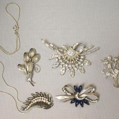 1257	STERLING SILVER RHINESTONE PIN ASSORTMENT INCLUDING UNMARKED PENDANT ON STERLING SILVER CHAIN
