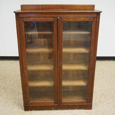1164	VICTORIAN OAK 2 DOOR GLASS BOOKCASE, APPROXIMATEL 50 IN X 14 IN X 57 IN HIGH
