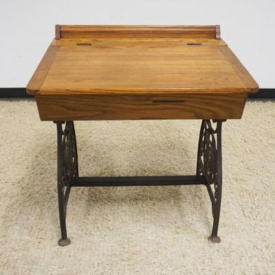 1157A	OAK VICTORIAN SCHOOL DESK W/FANCY WROUGHT IRON SIDES, APPROXIMATELY 30 IN X 24 IN X 33 IN HIGH
