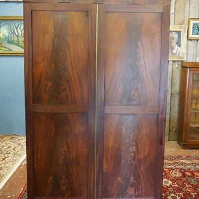 1179	ANTIQUE MAHOGANY 2 DOOR WARDROBE ON BUN FEET WINTERIOR DRAWRS & FLAMED MAHOGANY PANELED DOORS DOVETAIL CONSTRUCTION,...