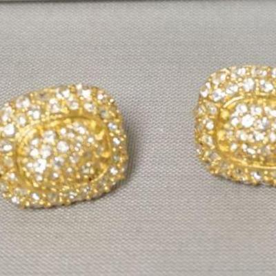 1212	CHRISTIAN DIOR DIAMOND STONE EARRINGS.
